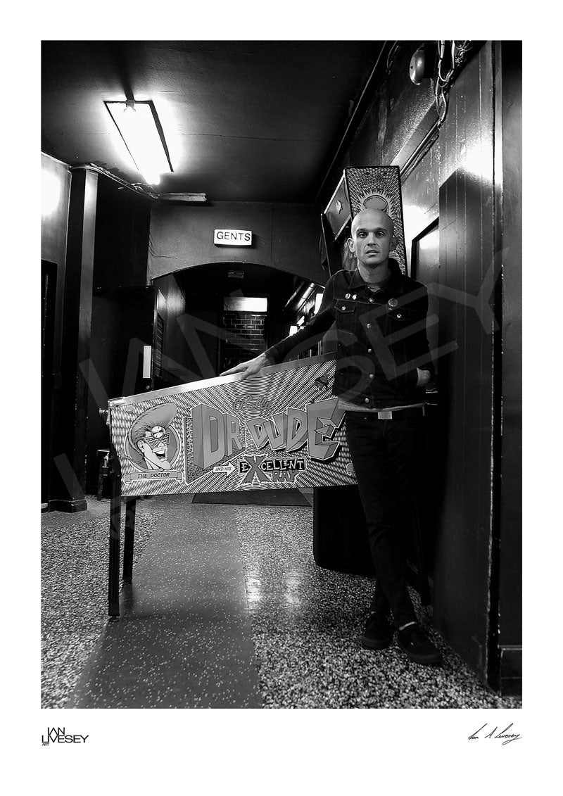 Zach Blair in front of the Dr Dude Pinball machine - Limited Print Run