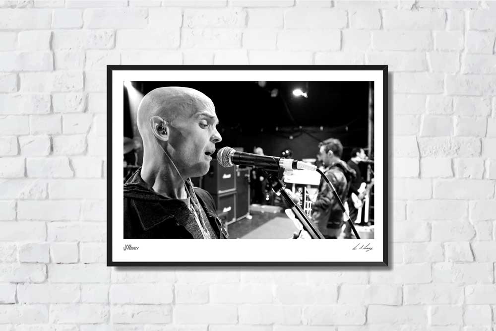 Zach Blair in rehearsals singing close to mic - Limited Edition